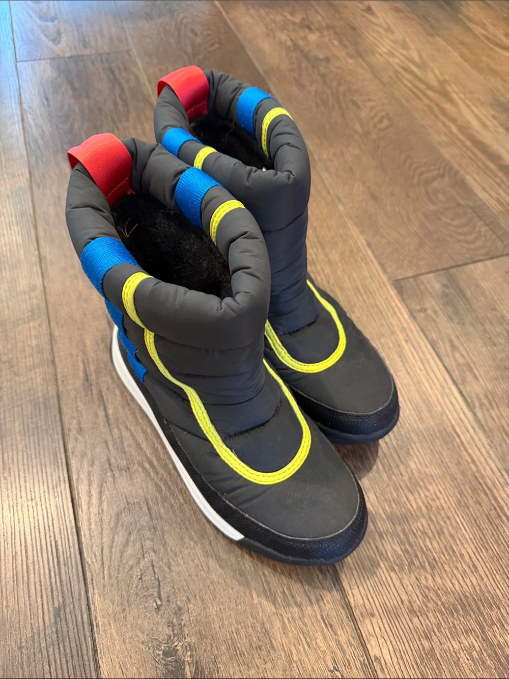 Sorel Kids Black Snow Boots with Yellow, Blue & Red Accents